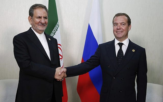 Russian Prime Minister Dmitry Medvedev, right, and Iranian Vice President Eshaq Jahangiri at the First Caspian Economic Forum in Turkmenbashi, Turkmenistan, August 12, 2019. (Dmitry Astakhov, Sputnik, Government Pool Photo via AP) Russian Prime Minister Dmitry Medvedev, right, and Iranian Vice President Eshaq Jahangiri at the First Caspian Economic Forum in Turkmenbashi, Turkmenistan, August 12, 2019. (Dmitry Astakhov, Sputnik, Government Pool Photo via AP)