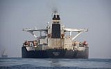 A stern view of the Grace 1 super tanker in the British territory of Gibraltar, Thursday, Aug. 15, 2019, seized last month in a British Royal Navy operation off Gibraltar. (AP Photo/Marcos Moreno)