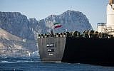 Renamed Adrian Aryra 1 super tanker hosting an Iranian flag sails in the waters in the British territory of Gibraltar, August 18, 2019.  (AP Photo/Marcos Moreno)