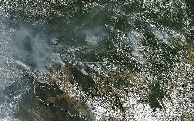 This satellite image provided by NASA on August 13, 2019 shows several fires burning in the Brazilian Amazon forest. (NASA via AP) This satellite image provided by NASA on August 13, 2019 shows several fires burning in the Brazilian Amazon forest. (NASA via AP)