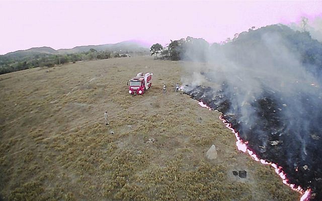 In this August 20, 2019 drone photo released by the Corpo de Bombeiros de Mato Grosso, brush fires burn in Guaranta do Norte municipality, Mato Grosso state, Brazil. (Corpo de Bombeiros de Mato Grosso via AP) In this August 20, 2019 drone photo released by the Corpo de Bombeiros de Mato Grosso, brush fires burn in Guaranta do Norte municipality, Mato Grosso state, Brazil. (Corpo de Bombeiros de Mato Grosso via AP)