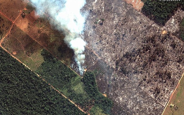 This August 15, 2019 satellite image from Maxar Technologies shows a closeup view of a fire southwest of Porto Velho, Brazil. (Satellite image ©2019 Maxar Technologies via AP) This August 15, 2019 satellite image from Maxar Technologies shows a closeup view of a fire southwest of Porto Velho, Brazil. (Satellite image ©2019 Maxar Technologies via AP)