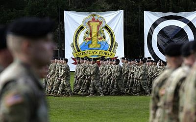 U.S. Army troops march in formation during a change of command ceremony, Monday, April 3, 2017, at Joint Base Lewis-McChord in Washington state. (AP/Ted S. Warren)