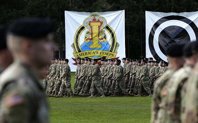 U.S. Army troops march in formation during a change of command ceremony, Monday, April 3, 2017, at Joint Base Lewis-McChord in Washington state. (AP/Ted S. Warren) U.S. Army troops march in formation during a change of command ceremony, Monday, April 3, 2017, at Joint Base Lewis-McChord in Washington state. (AP/Ted S. Warren)