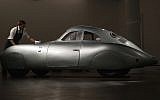 A 1939 Porsche Type 64, the oldest car to wear a Porsche badge and the personal car of German car designer and manufacturer Ferdinand and Ferry Porsche on display during a press preview at Sotheby's auction house in London, May 21, 2019. (Alastair Grant/AP)