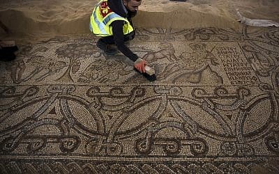 In this July 16, 2019 photo, Palestinians work on a preservation of a Byzantine period mosiac near Jebaliya refugee camp, northern Gaza Strip. (AP Photo/Khalil Hamra) In this July 16, 2019 photo, Palestinians work on a preservation of a Byzantine period mosiac near Jebaliya refugee camp, northern Gaza Strip. (AP Photo/Khalil Hamra)