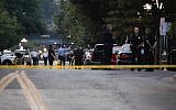 Authorities work the scene of a mass shooting, August 4, 2019, in Dayton, Ohio (AP Photo/John Minchillo)