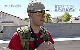 This Sept. 22, 2016, photo from video from KTNV 13 Action News shows Conor Climo during an interview while walking a Las Vegas neighborhood, heavily armed.  (KTNV 13 Action News via AP)