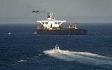 A supertanker hosting an Iranian flag is seen on the water in the British territory of Gibraltar, August 18, 2019. (AP Photo/ Marcos Moreno)