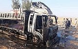 This photo released by Popular Mobilization Forces shows shows the aftermath of a drone attack near Qaim border crossing with Syria, in Anbar province, Iraq, August 25, 2019. (Popular Mobilization Forces via AP)