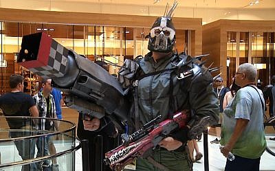 In this image taken from video on August 29, 2014, people begin to gather in Atlanta for Dragon Con. The science fiction convention, which runs through Labor Day, is one of the largest in the United States. (AP Photo/Alex Sanz)