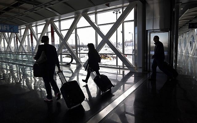 Illustrative: Travelers move through Logan International Airport in Boston January 28, 2015. (Elise Amendola/AP) Illustrative: Travelers move through Logan International Airport in Boston January 28, 2015. (Elise Amendola/AP)