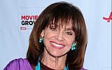 Valerie Harper arrives at the AARP Movies for Grownups Film Showcase at Regal Cinemas L.A. LIVE on Friday, November 7, 2014 in Los Angeles. (Photo by Vince Bucci/Invision for AARP/AP Images)