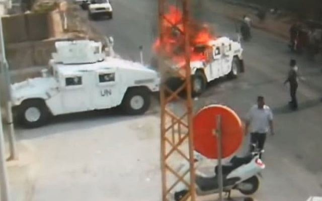 Hezbollah members set a United Nations peacekeepers' vehicle on fire in an incident in 2018 in southern Lebanon. the footage was first aired on August 28, 2019 (Screencapture/YouTube) Hezbollah members set a United Nations peacekeepers' vehicle on fire in an incident in 2018 in southern Lebanon. the footage was first aired on August 28, 2019 (Screencapture/YouTube)