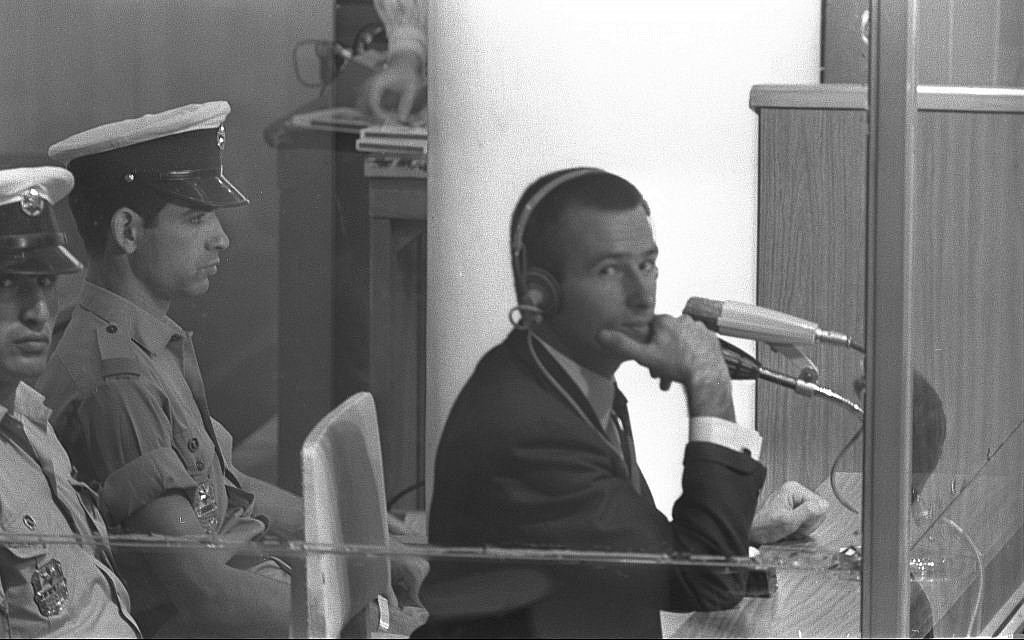 Denis Michael Rohan sits inside a bulletproof glass box at his trial for setting fire to the al-Aqsa Mosque, at Binyanei Hauma convention center, Jerusalem, October 7, 1969. (Fritz Cohen/GPO)