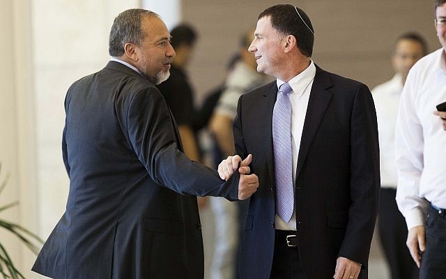 Yisrael Beytenu party leader Avigdor Liberman (L) shakes hands with Likud lawmaker Yuli Edelstein at the Knesset on March 14, 2013. (Yonatan Sindel/Flash90) Yisrael Beytenu party leader Avigdor Liberman (L) shakes hands with Likud lawmaker Yuli Edelstein at the Knesset on March 14, 2013. (Yonatan Sindel/Flash90)
