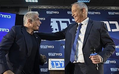Blue and White leaders Benny Gantz (right) and Yair Lapid speak during a campaign event in Kiryat Ono, on August 7, 2019. (Flash90)