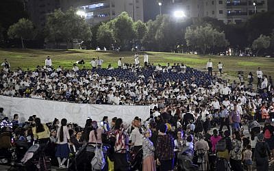 File: Ultra-Orthodox Jews at a concert featuring Haredi singer Motti Steinmetz, in a show where men and women in the audience sat separately, in the northern Israeli city of Afula on August 14, 2019. (Meir Vaknin/Flash90)