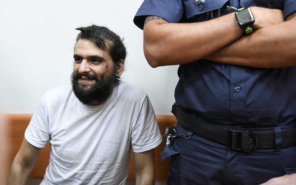 Telegrass founder Amos Dov Silver appears at the Rishon Lezion Magistrate's Court for a remand hearing on August 18, 2019, after being extradited to Israel from Ukraine. (Avi Dishi/Flash90) Telegrass founder Amos Dov Silver appears at the Rishon Lezion Magistrate's Court for a remand hearing on August 18, 2019, after being extradited to Israel from Ukraine. (Avi Dishi/Flash90)