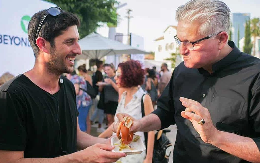 Vegan Friendly founder and CEO Omri Paz, left, with Yisrael Beytenu MK Eli Avidar. (Courtesy/Zman Yisrael)