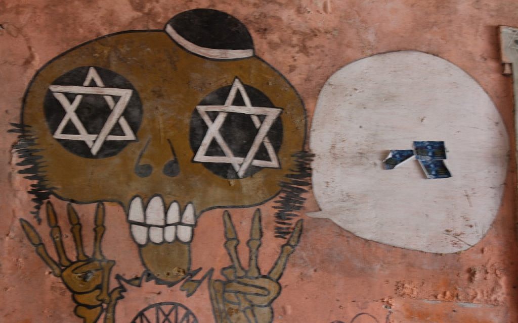 Anti-Semitic graffiti drawn onto the walls of the newly-reclaimed synagogue in Buenos Aires that for years had housed raves thrown by squatters. (Daniel Silicaro)