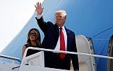 US President Donald Trump and first lady Melania Trump board Air Force One for a trip to Dayton, Ohio and El Paso, Texas, at Andrews Air Force Base, Maryland, August 7, 2019. (AP Photo/Evan Vucci)