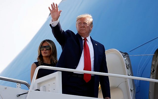 US President Donald Trump and first lady Melania Trump board Air Force One for a trip to Dayton, Ohio and El Paso, Texas, at Andrews Air Force Base, Maryland, August 7, 2019. (AP Photo/Evan Vucci) US President Donald Trump and first lady Melania Trump board Air Force One for a trip to Dayton, Ohio and El Paso, Texas, at Andrews Air Force Base, Maryland, August 7, 2019. (AP Photo/Evan Vucci)