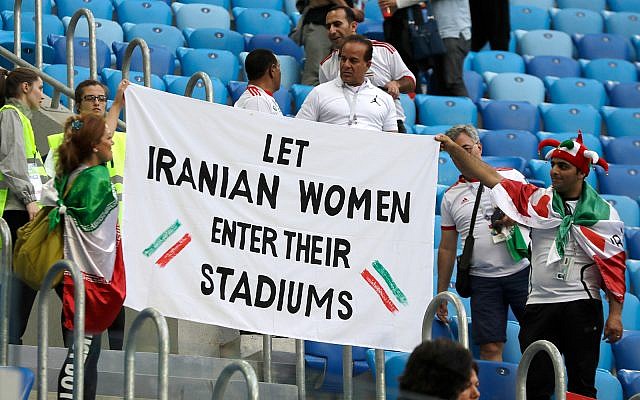 Supporters of Iranian women hold a banner at a match between Morocco and Iran at the 2018 in St. Petersburg, Russia, June 15, 2018. (AP Photo/Themba Hadebe) Supporters of Iranian women hold a banner at a match between Morocco and Iran at the 2018 in St. Petersburg, Russia, June 15, 2018. (AP Photo/Themba Hadebe)
