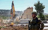 Israeli security forces demolish a building near Beit Jala in the West Bank, August 26, 2019. (Wisam Hashlamoun/Flash90)