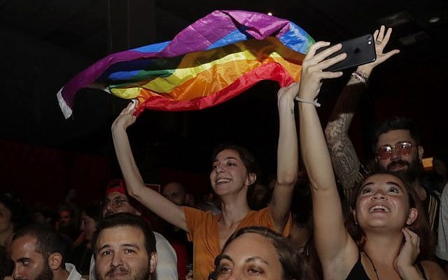 A girl waves a rainbow flag during a concert organized in solidarity with Lebanese indie band Mashrou' Leila in Lebanon's capital Beirut, August 9, 2019. (Anwar Amro/AFP) A girl waves a rainbow flag during a concert organized in solidarity with Lebanese indie band Mashrou' Leila in Lebanon's capital Beirut, August 9, 2019. (Anwar Amro/AFP)