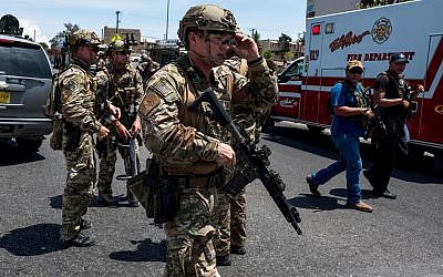 Law enforcement agencies respond to an active shooter at a WalMart near Cielo Vista Mall in El Paso, Texas, August 3, 2019. (Joel Angel Juarez/AFP)