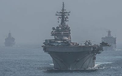 American warships USS Boxer, front, USNS Tippecanoe, right, USS John P. Murtha  transit the Strait of Hormuz, July 18, 2019. (US Marine Corps photo by Cpl. Jason Monty/Released)