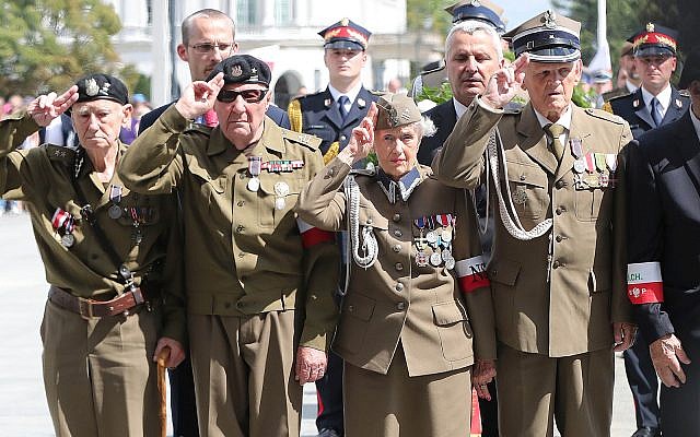 Polish officials and war veterans pay tribute to a World War II-era underground force that collaborated with Nazi German forces toward the end of the war in Warsaw, Poland, August 11, 2019. (AP Photo/Czarek Sokolowski) Polish officials and war veterans pay tribute to a World War II-era underground force that collaborated with Nazi German forces toward the end of the war in Warsaw, Poland, August 11, 2019. (AP Photo/Czarek Sokolowski)