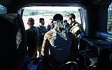 One of the suspects in the murder of Dvir Sorek after being arrested by the Border Police and IDF in the West Bank on August 10, 2019. (Israel Defense Forces)