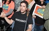 Ady Barkan attends the Los Angeles Supports a Dream Act Now! protest at the office of California Senator Dianne Feinstein on January 3, 2018 in Los Angeles, California. (Gabriel Olsen/Getty Images via JTA)