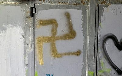Two youths were arrested for spray-painting swastikas and other graffiti on the walls of a street in Jerusalem’s Old City on August 12, 2019. (Israel Police)