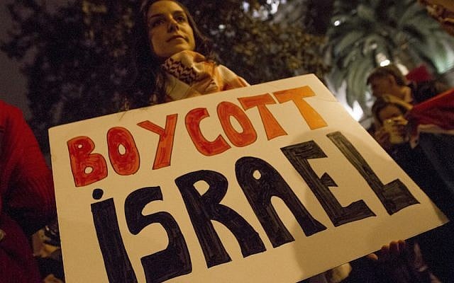 Illustrative: Demonstrators hold placards outside the Spanish Government Delegation in Barcelona on October 20, 2015 during a protest demanding an end to the collaboration between Spanish and Israeli institutions and Israeli violations in the West Bank and Jerusalem. (Photo by Albert Llop/Anadolu Agency/Getty Images via JTA) Illustrative: Demonstrators hold placards outside the Spanish Government Delegation in Barcelona on October 20, 2015 during a protest demanding an end to the collaboration between Spanish and Israeli institutions and Israeli violations in the West Bank and Jerusalem. (Photo by Albert Llop/Anadolu Agency/Getty Images via JTA)