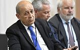 French Foreign Affairs Minister Jean-Yves Le Drian attends a French president's press conference in Biarritz, southwest France on August 26, 2019, on the third day of the annual G7 Summit attended by the leaders of the world's seven richest democracies, Britain, Canada, France, Germany, Italy, Japan and the United States. (Photo by Bertrand GUAY / AFP)