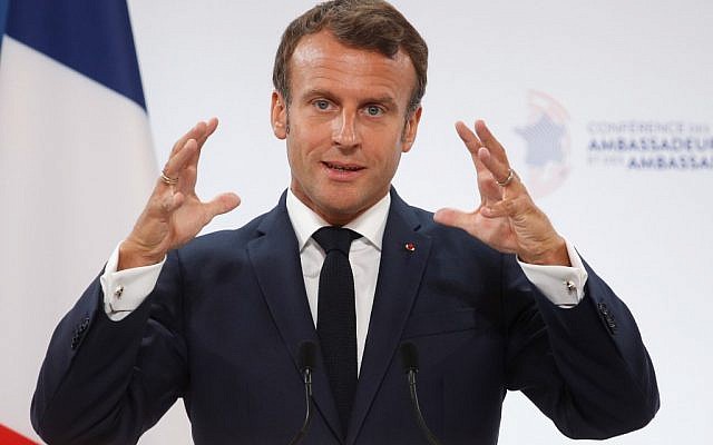 French President Emmanuel Macron gestures as he delivers a speech during the annual French ambassadors conference at the Elysee Palace in Paris on August 27, 2019. (Yoan VALAT / POOL / AFP) French President Emmanuel Macron gestures as he delivers a speech during the annual French ambassadors conference at the Elysee Palace in Paris on August 27, 2019. (Yoan VALAT / POOL / AFP)