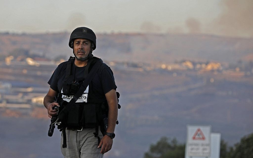 A member of the Israeli security forces stands at a security checkpoint near the northern Israeli town of Avivim, close to the border with Lebanon, on September 1, 2019. (Jalaa MAREY / AFP)