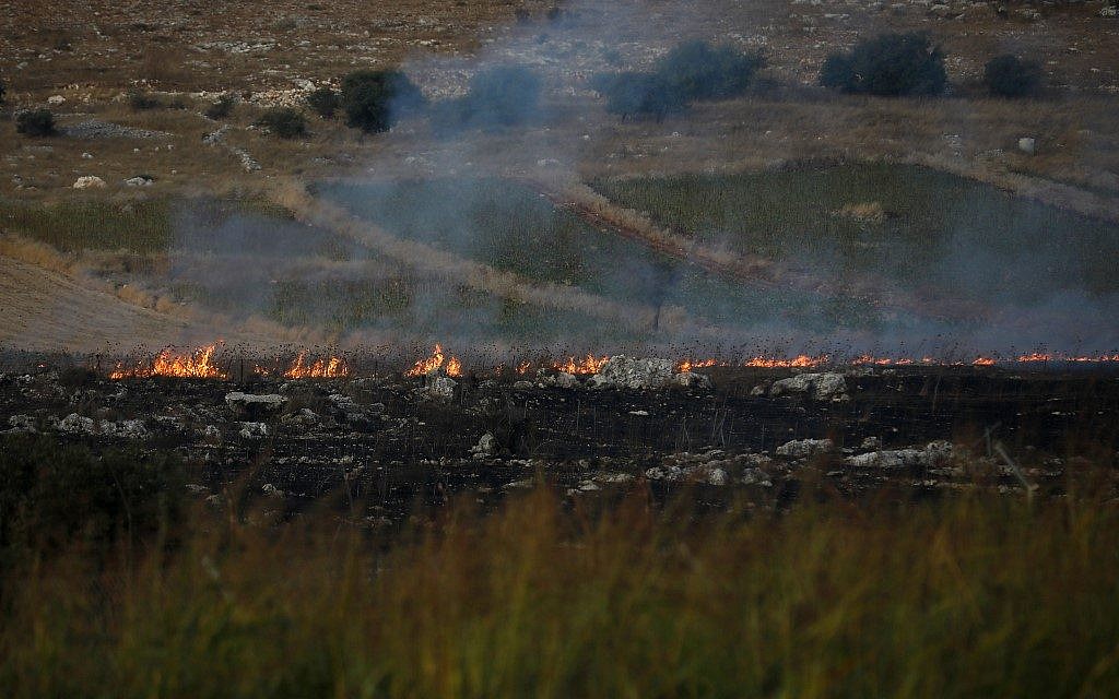 This picture taken on September 1, 2019 from a location near the northern Israeli town of Avivim, close to the border with Lebanon, shows fires and smoke rising after Lebanon's Shiite Hezbollah terror movement fired anti-tank missiles into northern Israel (Jalaa MAREY / AFP)