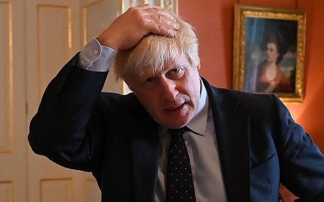 Britain's Prime Minister Boris Johnson reacts as he greets NHS workers as they take afternoon tea inside 10 Downing Street in central London on September 3, 2019. (Photo by DANIEL LEAL-OLIVAS / various sources / AFP) Britain's Prime Minister Boris Johnson reacts as he greets NHS workers as they take afternoon tea inside 10 Downing Street in central London on September 3, 2019. (Photo by DANIEL LEAL-OLIVAS / various sources / AFP)