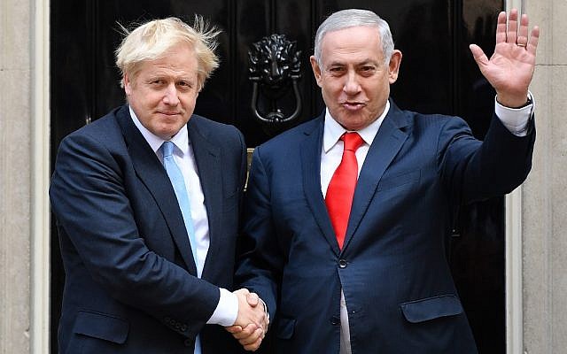 Britain's Prime Minister Boris Johnson (L) greets Prime Minister Benjamin Netanyahu outside 10 Downing Street in central London on September 5, 2019. (DANIEL LEAL-OLIVAS / AFP) Britain's Prime Minister Boris Johnson (L) greets Prime Minister Benjamin Netanyahu outside 10 Downing Street in central London on September 5, 2019. (DANIEL LEAL-OLIVAS / AFP)