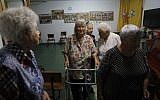 Israeli elderly women take part in a morning workout in a former hotel turned into a social housing building for elderly Israelis from the former Soviet Union, in Jerusalem on September 4, 2019. (Menahem Kahana/AFP)