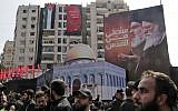 Members of the Lebanese terror group Hezbollah stand guard during a religious mourning procession on the tenth day of the lunar month of Muharram, which marks the day of Ashura, in Beirut, on September 10, 2019. (Anwar Amro/AFP)