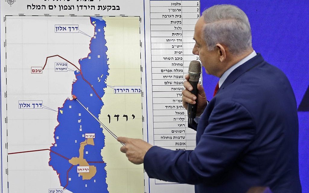 Prime Minister Benjamin Netanyahu points at a map of the Jordan Valley as he gives a statement, promising to extend Israeli sovereignty to the Jordan Valley and northern Dead Sea area, in Ramat Gan on September 10, 2019. (Menahem Kahana/AFP) Prime Minister Benjamin Netanyahu points at a map of the Jordan Valley as he gives a statement, promising to extend Israeli sovereignty to the Jordan Valley and northern Dead Sea area, in Ramat Gan on September 10, 2019. (Menahem Kahana/AFP)