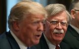 Then-National Security Adviser John Bolton (R) listens to US President Donald Trump on April 9, 2018 former 
. (Mark Wilson/Getty Images North America/AFP)