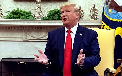 US President Donald Trump speaks to reporters in the Oval Office at the White House in Washington, on September 11, 2019. (Nicholas Kamm/AFP)