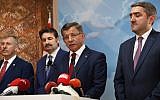 Former Turkish Prime Minister Ahmet Davutoglu (2ndR) holds a press conference at his office in Ankara on September 13, 2019, to announce that he will launch a new political movement in the latest challenge to President Recep Tayyip Erdogan from his former allies. (Adem Altan/AFP)