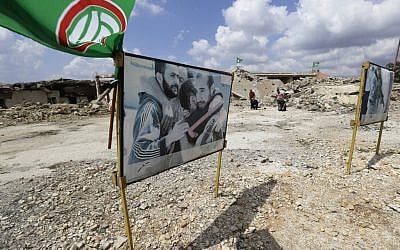 Pictures of past inmates are lined up at the entrace of the former Israeli-run prison of Khiam (Khiyam) on the Lebanese-Israeli border, on September 15, 2019. (JOSEPH EID/AFP)